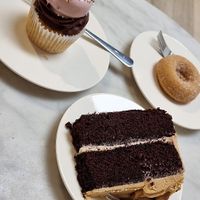 Chocolate cupcake with mini doughnut + Chocolate and caramel cake at Ruby's of London in South East London