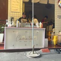 Store from front, oat milk on the right of the counter  at Càmatea in Ho Chi Minh