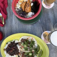 Grilled SALMoN Bowl along with Bahn Mi Tacos  at Hula's Island Grill in Monterey