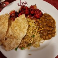 Puri bread with meal at Sitar in Rome