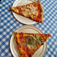 Cheezy and Nonno (artichoke, olives, pesto) at Doctor Drooly Slice Shop in Munich