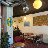 Pilkku displays interesting art on their walls and offer a decent amount of seating. at Pilkku in Helsinki