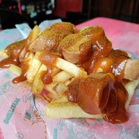 Delicious curry wurst! Perfectly cooked fries too. at Beelzebab in Brighton