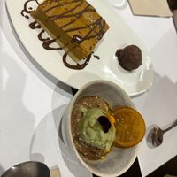 Luleå cake: Chocolate spiced pumpkin pie served with dark chocolate ice cream + Chestnut and cocoa tart cream with pistachio ice cream at Restaurante Oslo in Valencia