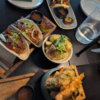 Cauliflower bao buns, jackfruit tacos, hassleback p potatoes, tempura vegetables at FortySix in Malton