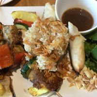 Grilled satay tempeh and veggie skewers at Lotus Seed Vegan in Vancouver