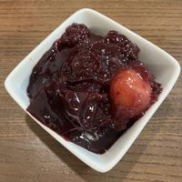 Jello-like dessert with chunks of fruit  at Tallarin Verde Peruvian Restaurant in Blairsville