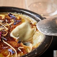 Matcha crème brûlée with dried flowers at Bloom Sushi Marais in Paris
