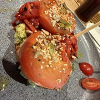 avocado on toast with red pepper and tomato  at Glebe Farm Shop & Tea Room in Kettering