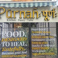 Outside at Pūrnah: Kitchen. Pantry. Table in Mumbai