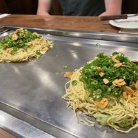 Vegan okonomiyaki served hot on the grill. at Nagataya in Hiroshima