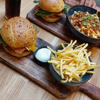 No chicken burgers + lucifer loaded fries at Tabi Loo Ixelles in Brussels