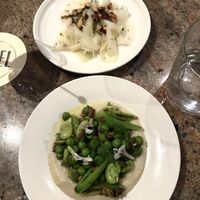 Kohlrabi with smoked almonds + spring peas, fennel & olive   at Hazel in Melbourne
