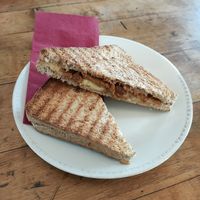 Grilled toast sandwich with cheese and seitan at Black Veg in Bonn
