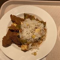 Brussel sprouts with tofu and tomato/pepper sauce with rice and fried Seiten  at Vega City in Budapest