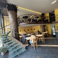 I just wanna go up that amazing staircase and eat vegan 🌱   at Vega City in Budapest