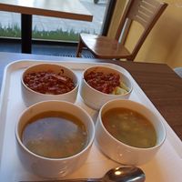 Autumn vegetable ragou soup and greenpea stew with mashed potato and onions at Vega City in Budapest
