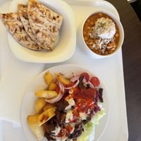 gyro bowl with flatbread and chickpea curry—cost around £12  at Vega City in Budapest