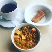 Indian curry and a breaded cashew cheese wedge.  at Vega City in Budapest