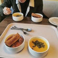 Soup, koftas in tomato sauce and fried cashew cheese at Vega City in Budapest