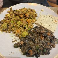 Tofu, marinated beans, vegan paella  at Amrita Caffè & Bistrot in Milan