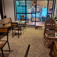 Outdoor seating  at Smile Cafe Auroville in Villupuram