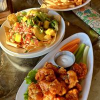 Wings, nachos and burger   at El Avion in Manuel Antonio