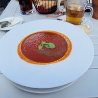 Vegan tomato soup with bread  at Fischers Mohrenplatz in Garmisch Partenkirchen