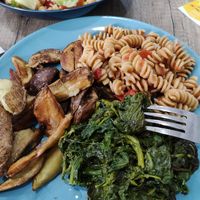 Pasta and potatoes and fresh greens at 'O Grin in Naples