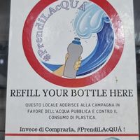 Great idea! Staff offered customers to refill their bottles. at 'O Grin in Naples