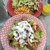 Cesar salad and plate with 3 dishes (beans, fennel and pesto pasta) at 'O Grin in Naples