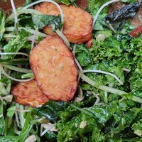 Tiny portion of tempeh for 40k (looks big because the photo is zoomed in but it's not) at Roots Plant-based Cafe - Hẻm 41 Xuan Thuy in Ho Chi Minh City