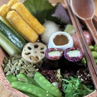 Japanese macrobiotic bowl. I like it has black rice, asian ingredients, and sea plants in it. Wish to have bigger tofu portion but the sauce was pretty nice and well harmonized.  at Roots Plant-based Cafe - Hẻm 41 Xuan Thuy in Ho Chi Minh City