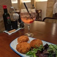 Bajtra liqueur cocktail (prickly pear) and cauliflower croquettes, both excellent at Ta' Nenu Valletta in Valletta