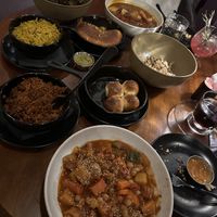 The jollof rice is insane actually, and I wish I could remember the name of the stew dish I had, but it was also phenomenal!! The Brussels in the far left corner were also 10/10.   at Okan Bluffton in Bluffton