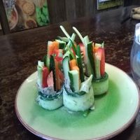 Delicious cashew cheese cucumber wrap rolls. at Mood Food Energy Cafe in Yangshuo