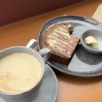 Oat milk latte with vegan banana bread and maple infused nuttlex  at Rich Market Cafe & Nursery in Abbotsford