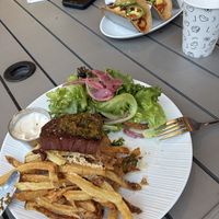 Steak frites and al pastor tacos  at LULU GREEN in Cambridge
