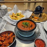 Moussaka (middle) corliflour mezze (left) and amazing fries at Zooba in Giza