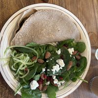 Vegan galette met paddestoelen, rucola and granaatappel pitten, met vegan witte kaas en gezouten amandelen  at SPOT. Nijmegen in Nijmegen