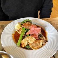 Crispy gyozas, teriyaki Chinese cabbage, charred Tenderstem®, miso aubergine, Gochujang dressing  at The Red Lion in Cambridge