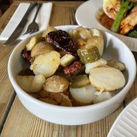 Warm new potato salad, smashed cucumbers, sun-dried tomatoes, asparagus  at The Red Lion in Cambridge