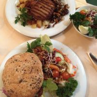 Vegan Kidney Chili Burger and vegan steak with salad. at Cafe Central in Flensburg