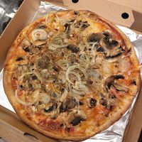 The "Swedish" pizza, with vegan cheese replacing the dairy cheese base and parmesan. Features garlic, mushrooms, onions and herbs. at Davardi's Pizza Bar in Worsley