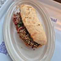 Baguette hummus & rattatouille at AMS - LOAF - Lounge 1 in Schiphol