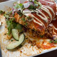 half eaten Chicken Tinga Burrito  at JOi Café in Westlake Village