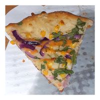 Vegan Elote Pizza slice at Picazzo's Organic Italian Kitchen in Tempe