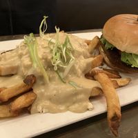 poutine and a burger  at MeeT on Main in Vancouver