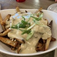 Vegan poutine. Yum! (Idk what regular poutine tastes like but still!)  at MeeT on Main in Vancouver