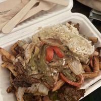 Butter Chikkin Poutine   at MeeT on Main in Vancouver